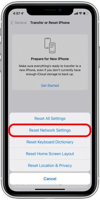 iPhone on Transfer or Reset iPhone settings screen with Reset Network Settings marked