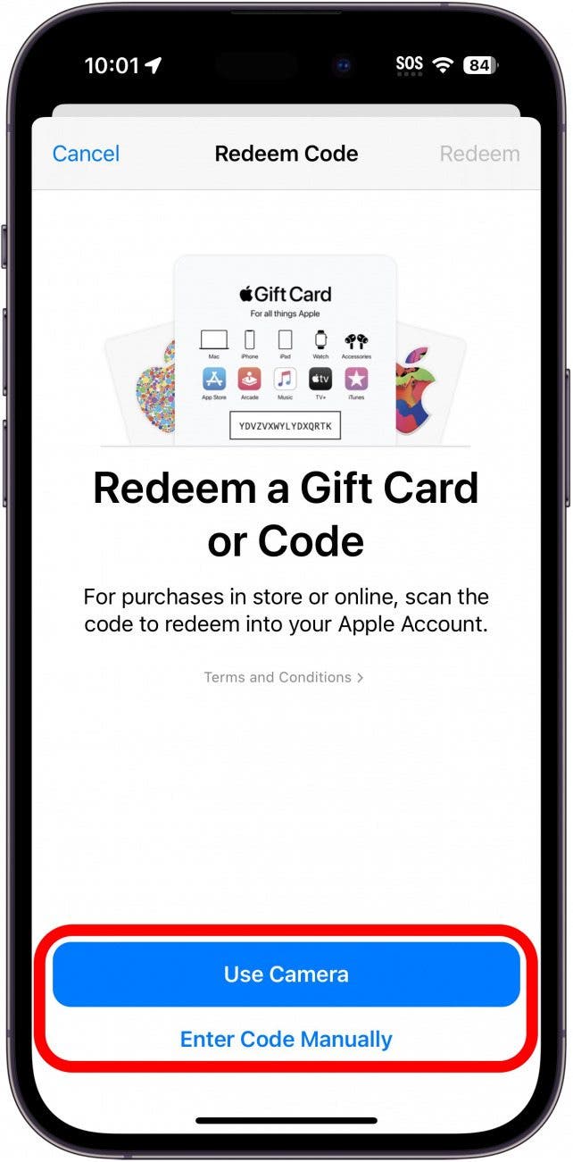 app store code redeem screen with red circle around use camera and enter code manually buttons
