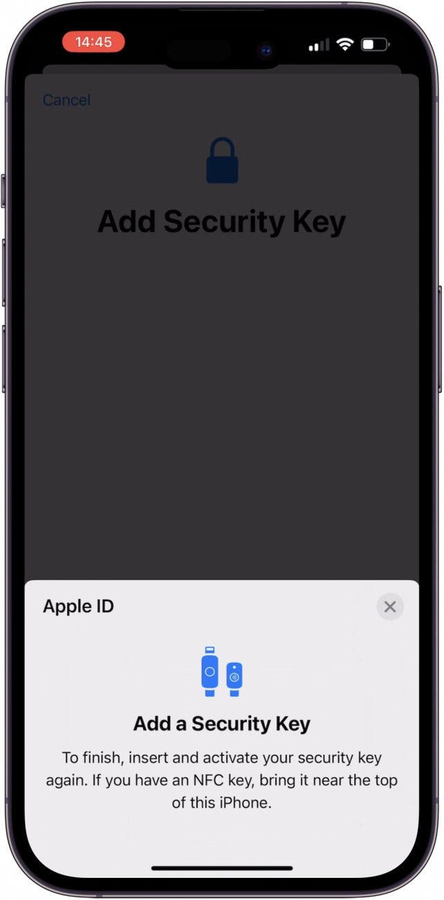 Insert or hold your security key up to your iPhone again
