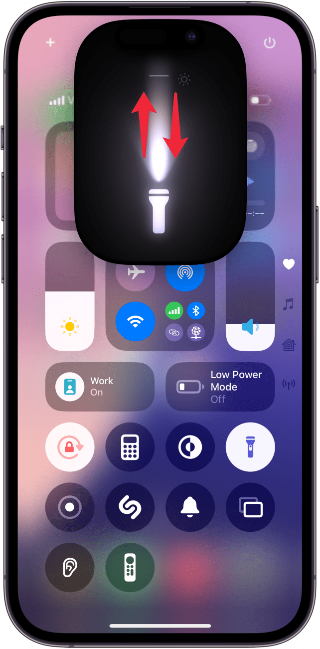 iphone control center with flashlight UI and red arrows pointing up and down