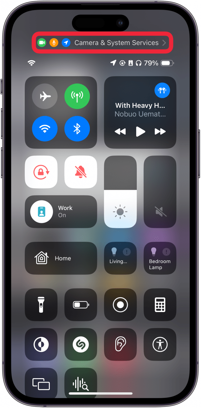 iphone control center with a red box around privacy icons at the top of the control center