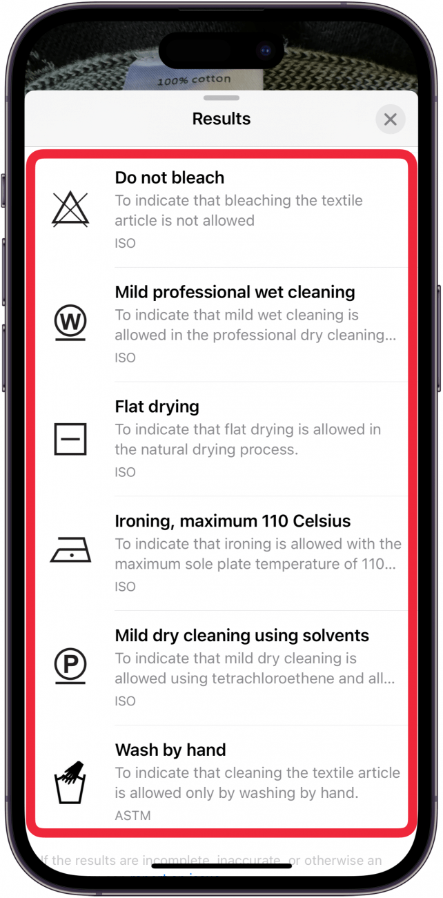 iphone photos app with the expanded visual lookup menu open, displaying different laundry symbols and their meanings with a red box surrounding them