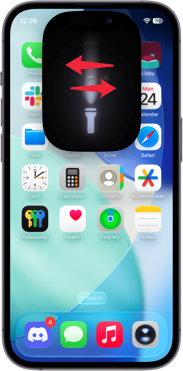 a screenshot of the iphone home screen displaying flashlight UI and red arrows pointing left and right
