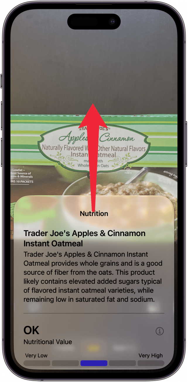a screenshot of visual intelligence on iphone displaying nutrition information for a box of oatmeal with a red arrow pointing upward, indicating to swipe up