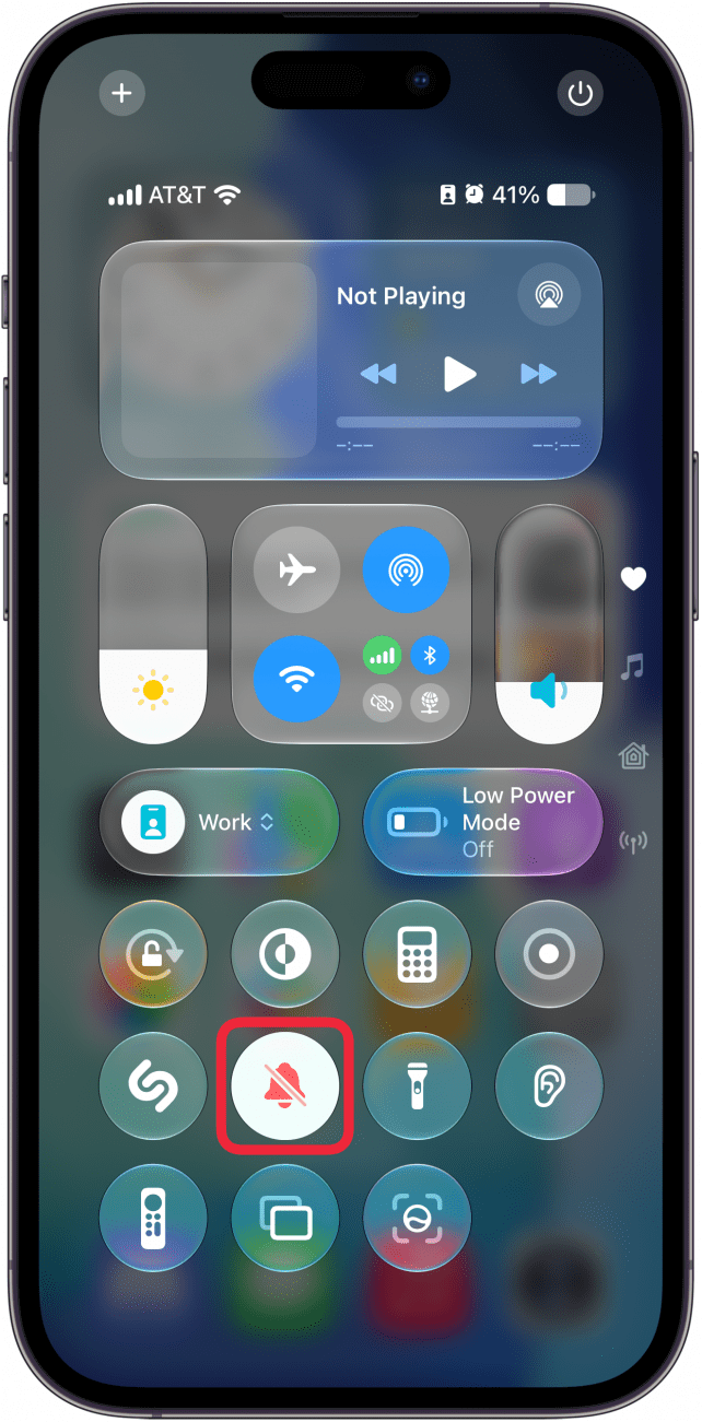 a screenshot of the control center on iphone with a red box around the silent mode toggle