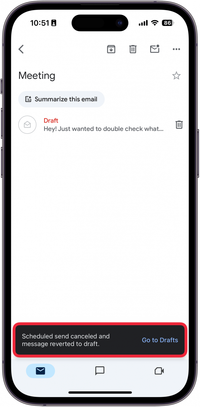 a screenshot of the iphone gmail app displaying scheduled emails with a red box around a banner at the bottom of the screen informing the user that the email has been moved to drafts