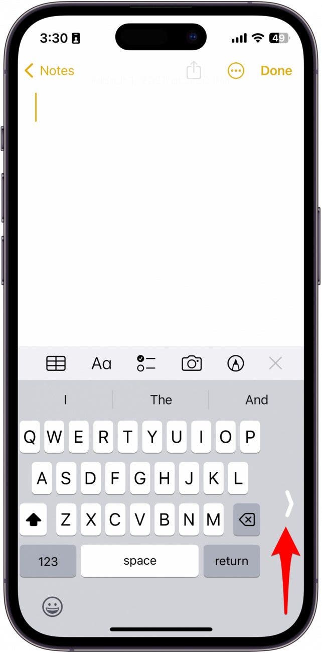 To go back to the full-screen keyboard, simply tap the large white arrow on the other side of the keyboard.