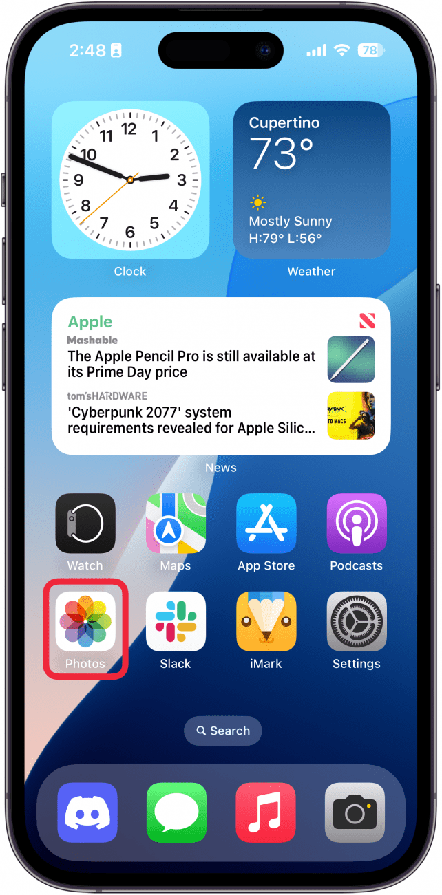 a screenshot of the iphone's home screen with a red box around the photos app