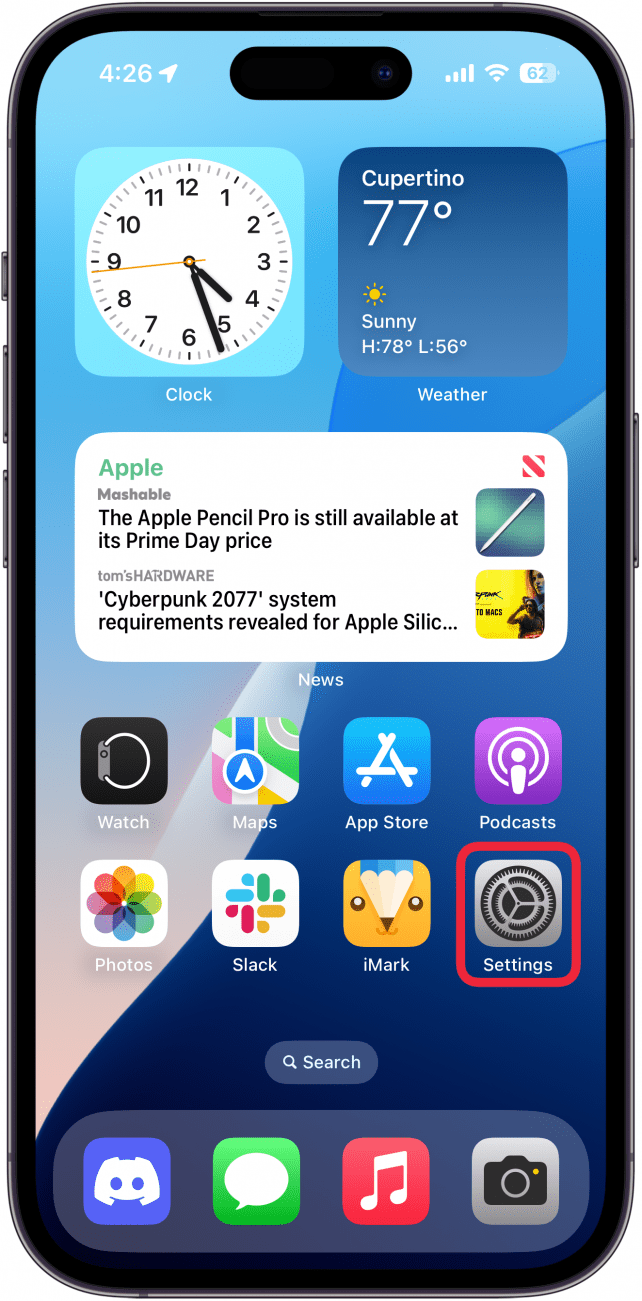 a screenshot of the iphone home screen with a red box around the settings app