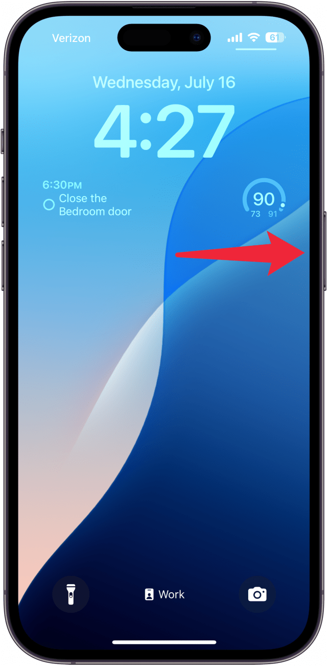 a screenshot of the iphone lock screen with a red arrow pointing to the iphone's side button