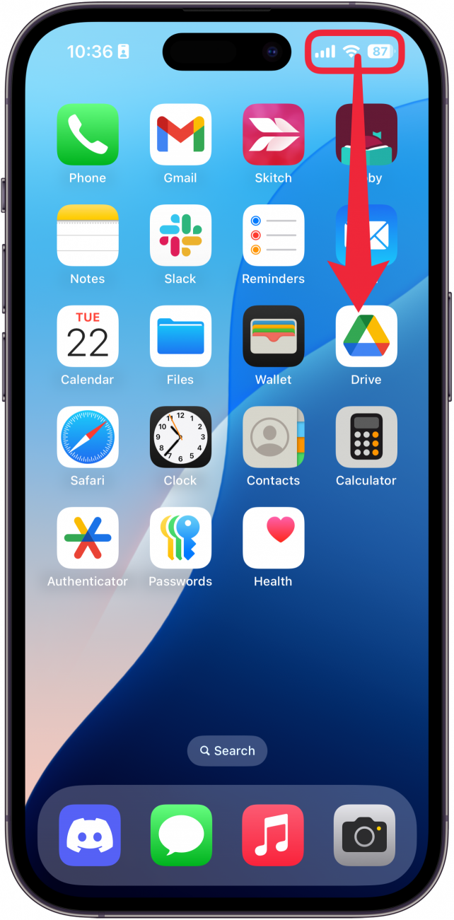 a screenshot of the iphone home screen with a red box around the top right corner with a red arrow pointing down, indicating to swipe down from the top right corner