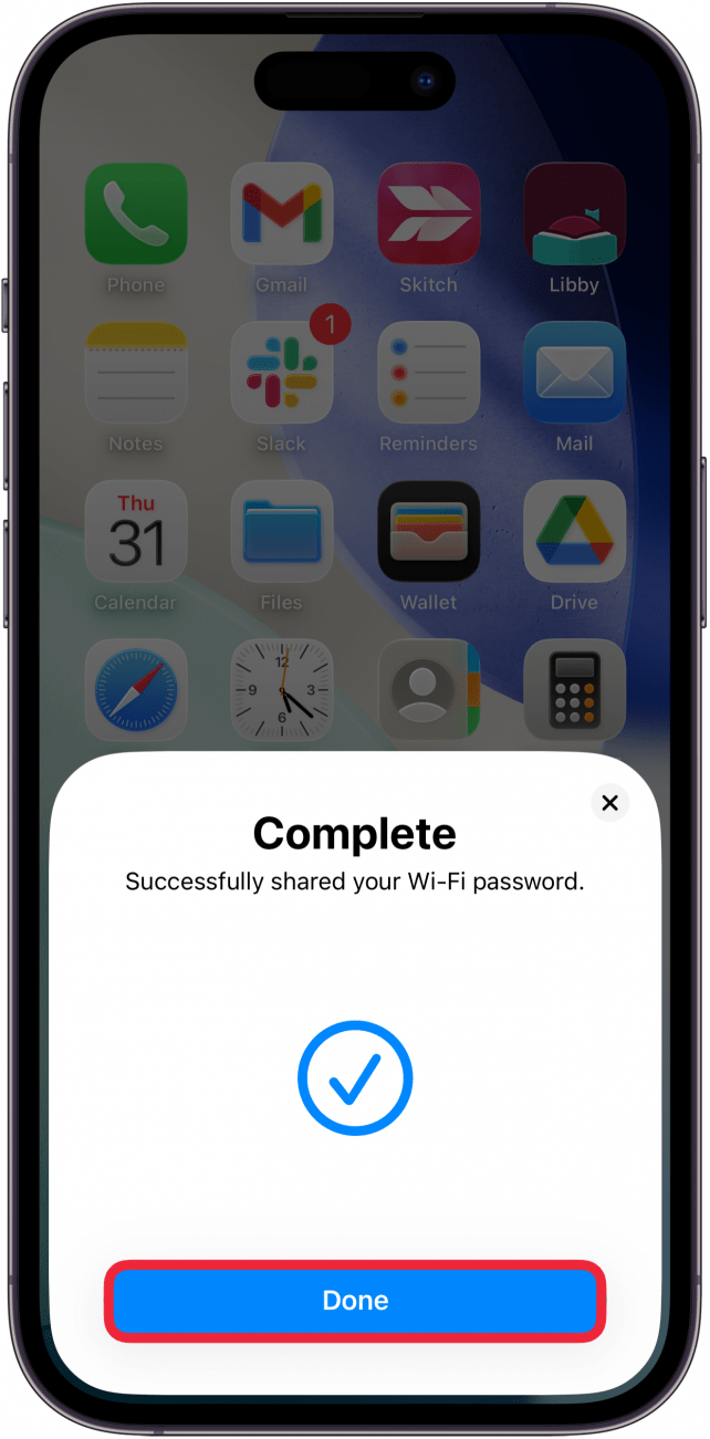 a screenshot of an iphone home screen displaying a pop-up asking the user if they would like to share their wi-fi password with a red box around the done button