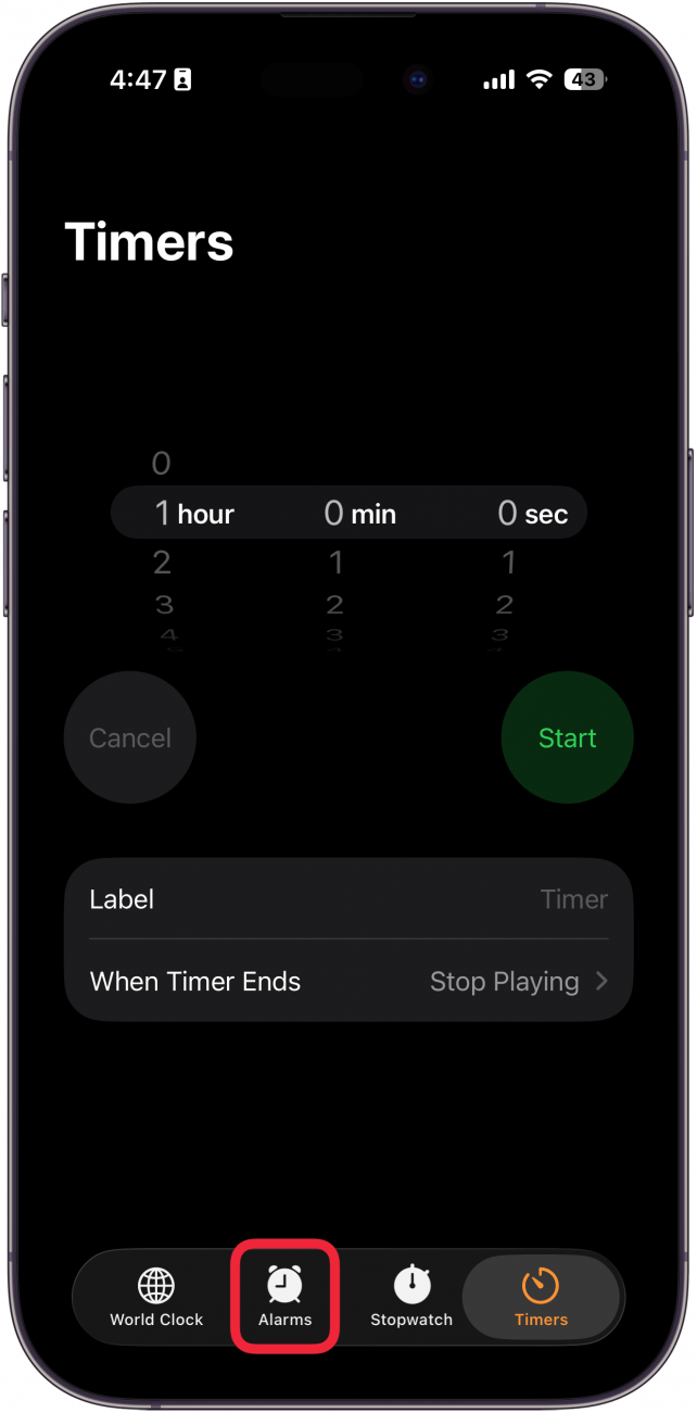 a screenshot of the iphone clock app with a red box around the alarms tab