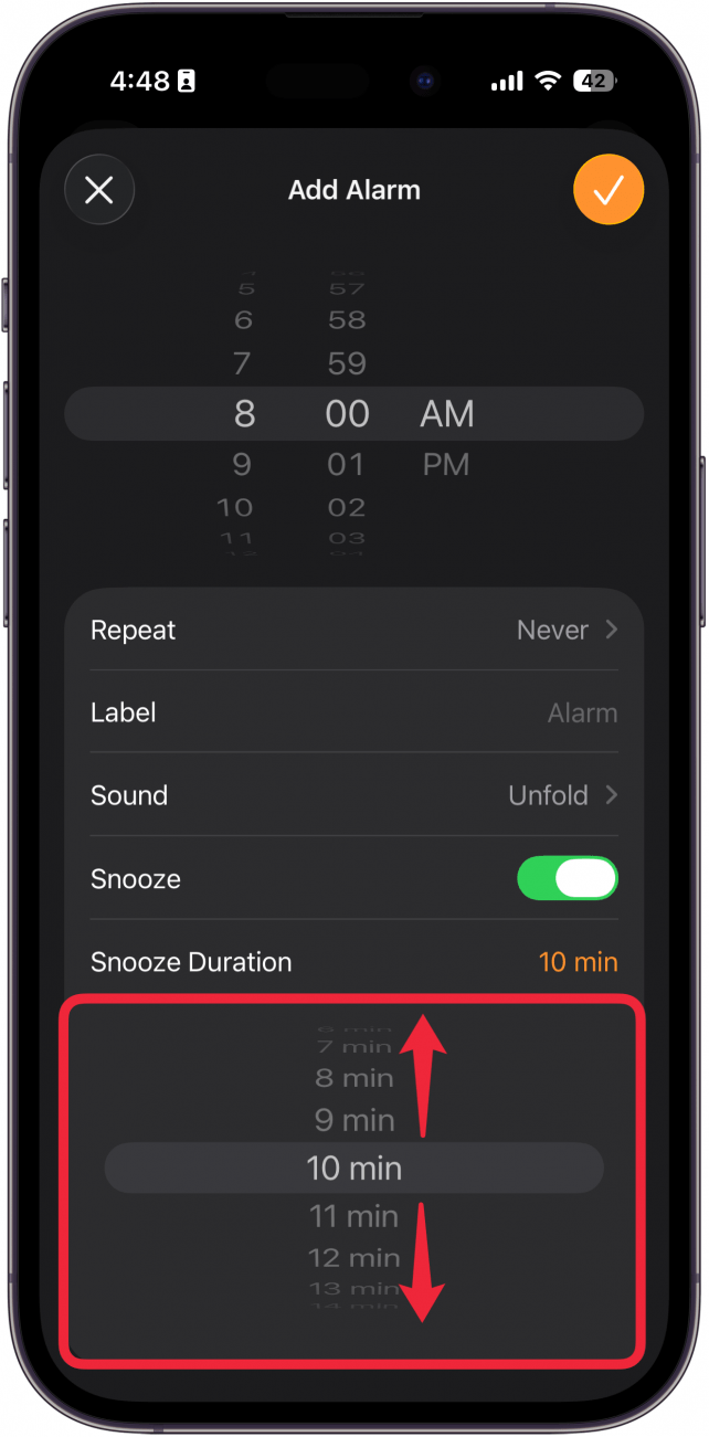 a screenshot of the iphone clock app's new alarm screen with a red box around the snooze duration scroll wheel and red arrows pointing up and down, indicating to scroll up or down