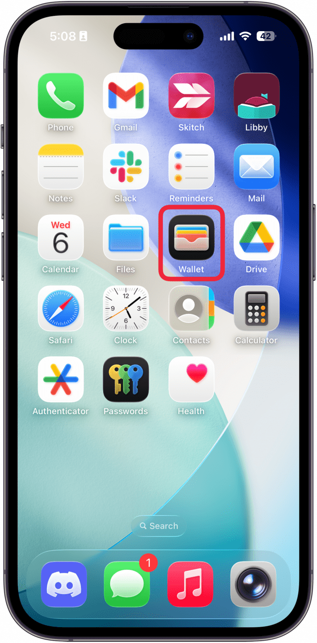 a screenshot of an iphone home screen with a red box around the wallet app