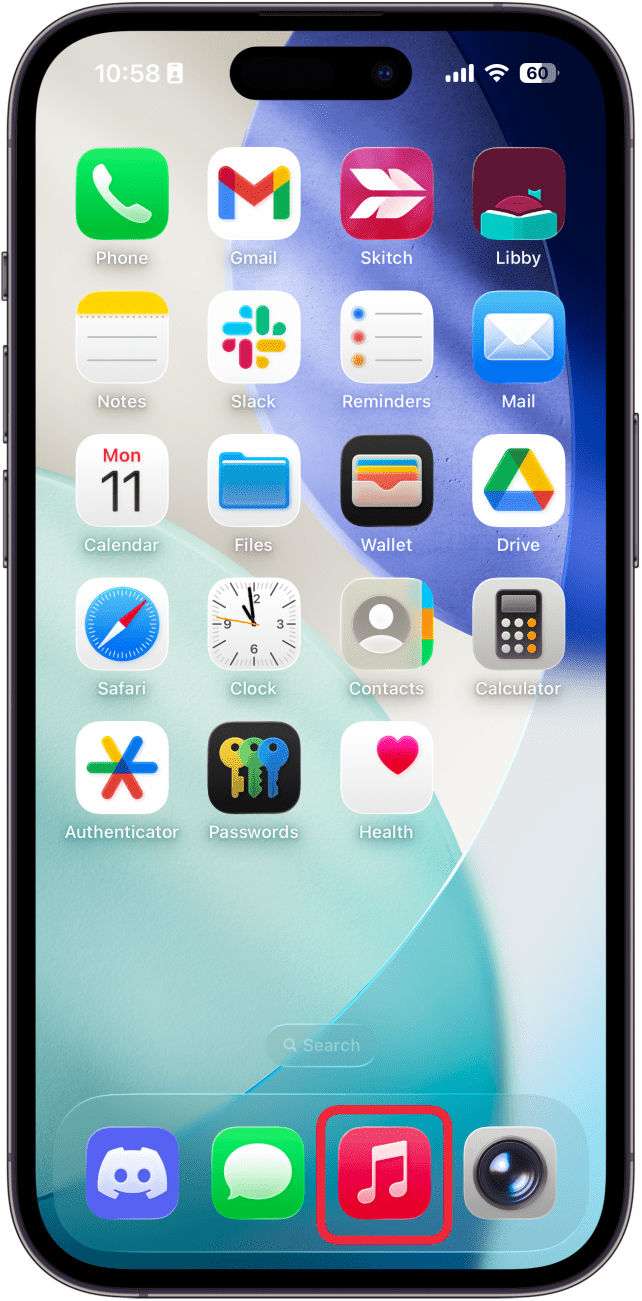 a screenshot of the iphone home screen with a red box around the music app