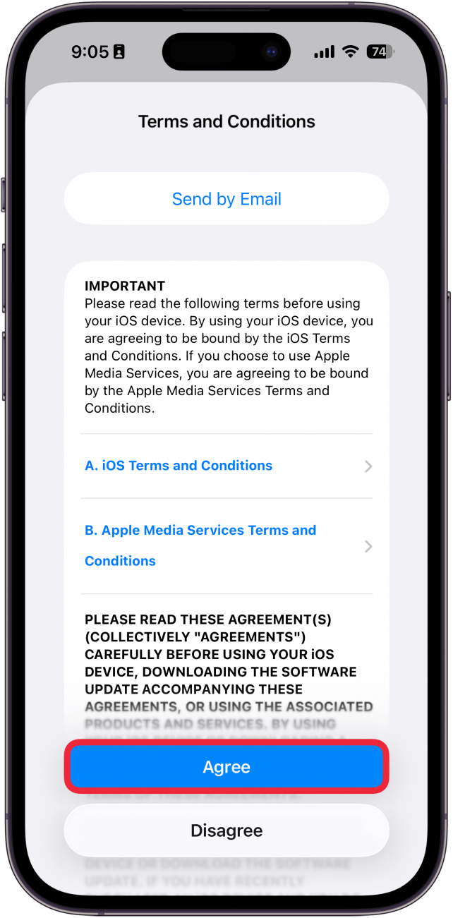 a screenshot of iphone software update process displaying terms and conditions with a red box around agree button