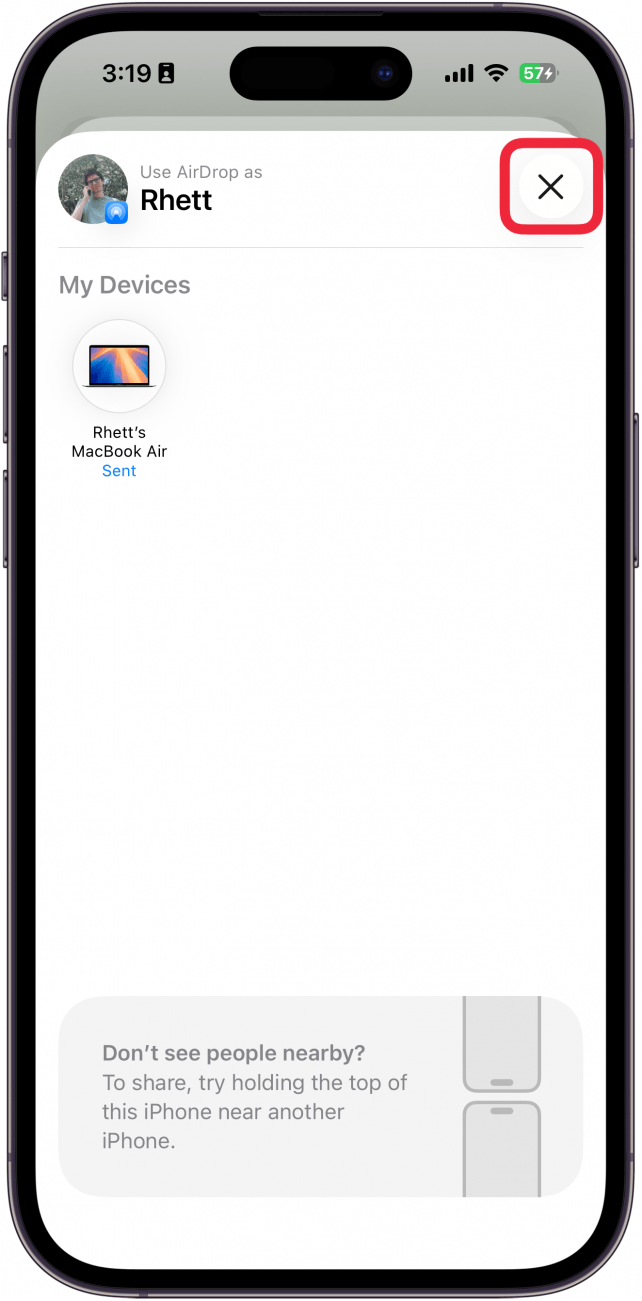 a screenshot of the airdrop screen on iphone with a red box around the x icon