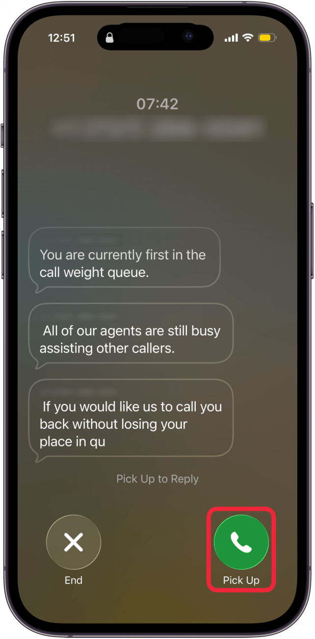 a screenshot of the hold assist call screen on iphone displaying a transcript of the call with a red box around the pick up button