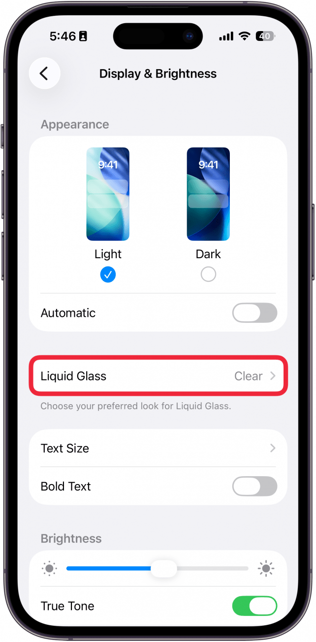 a screenshot of the display & brightness settings on an iphone with a red box around liquid glass