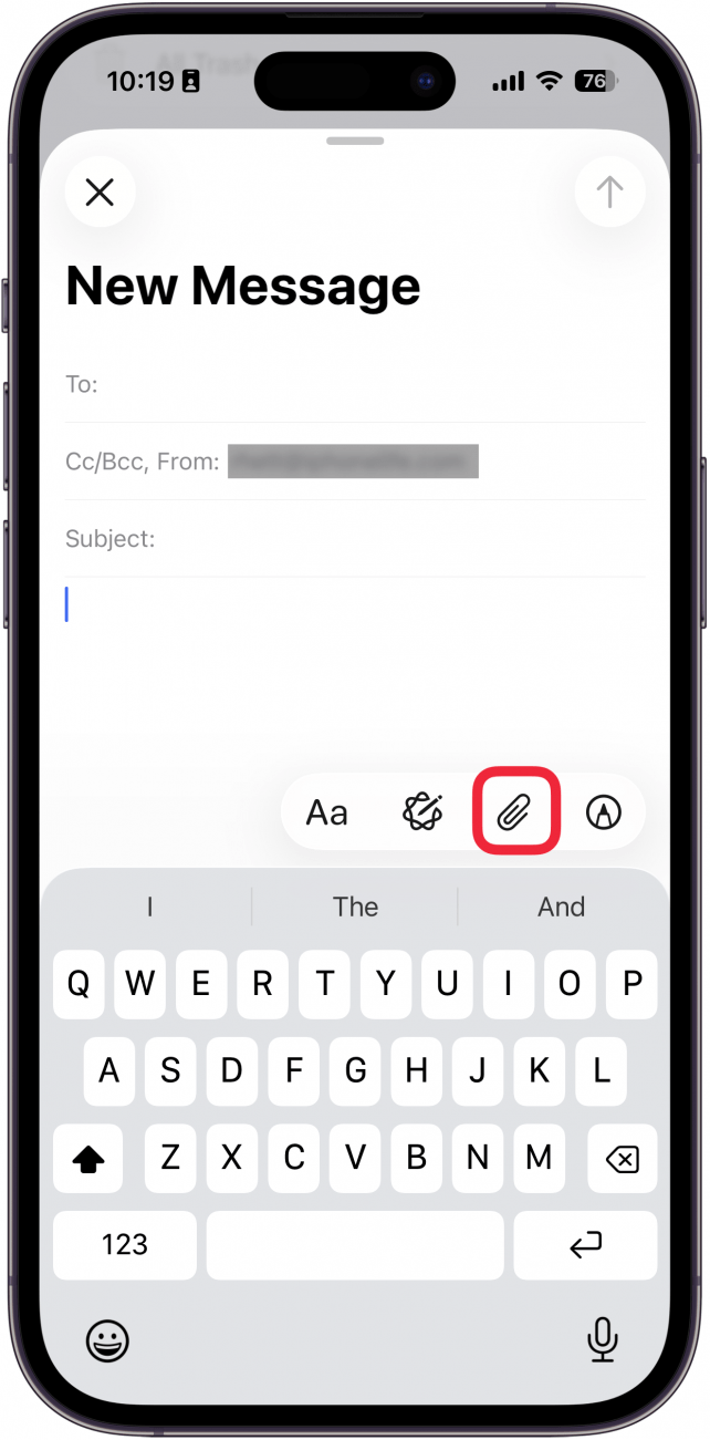 a screenshot of the new email screen on iphone with a red box around the attach button