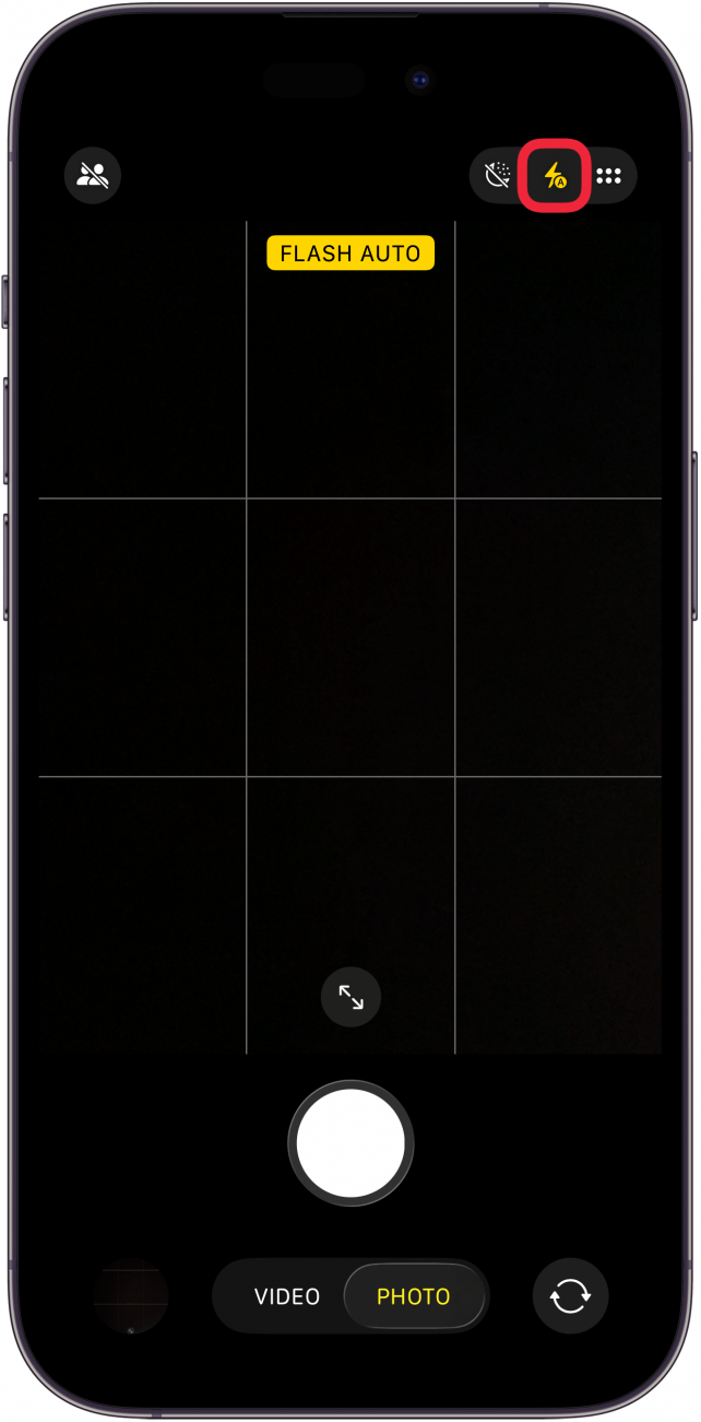a screenshot of the iphone camera app with flash icon circled in red. the icon itself is yellow, indicating flash is on.