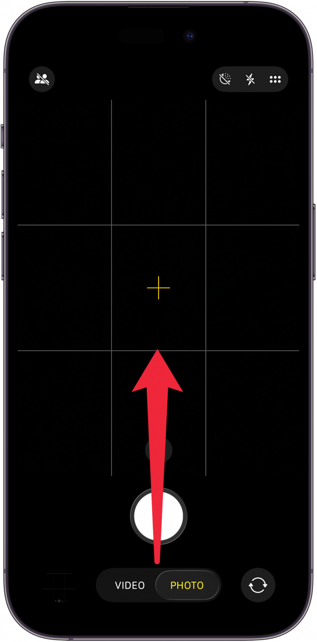 a screenshot of the iphone camera app with a red arrow point upwards from the middle of the screen, indicating to swipe up