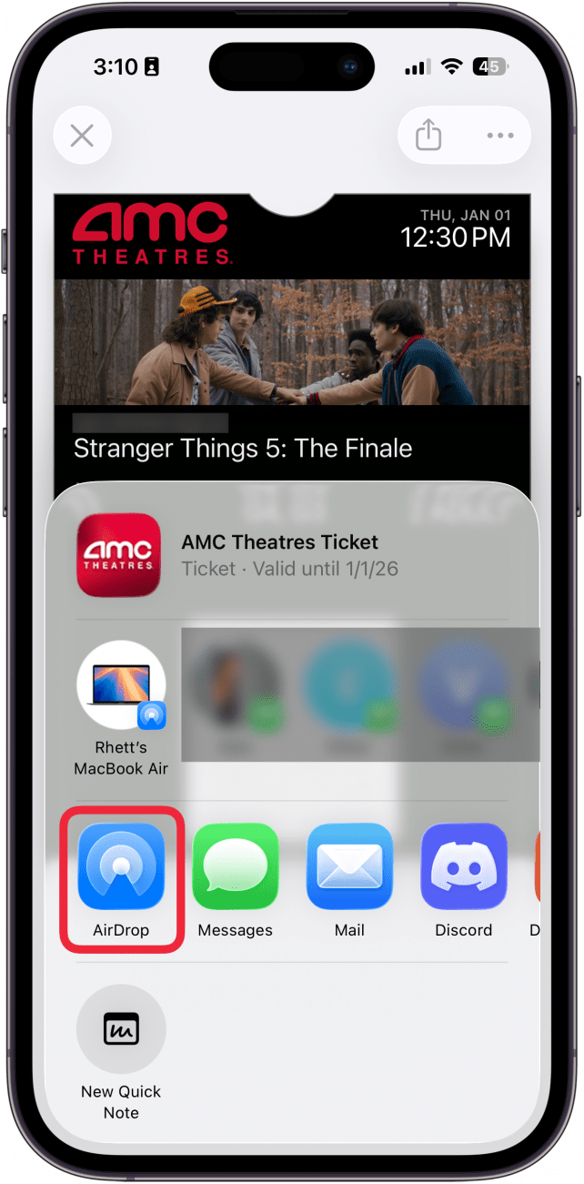 a screenshot of a movie ticket in the iphone wallet app displaying the share sheet with a red box around the airdrop icon