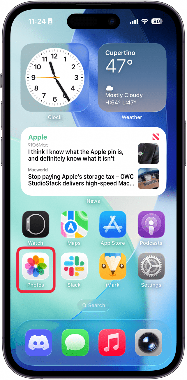 a screenshot of the home screen on an iphone with a red box around the photos app