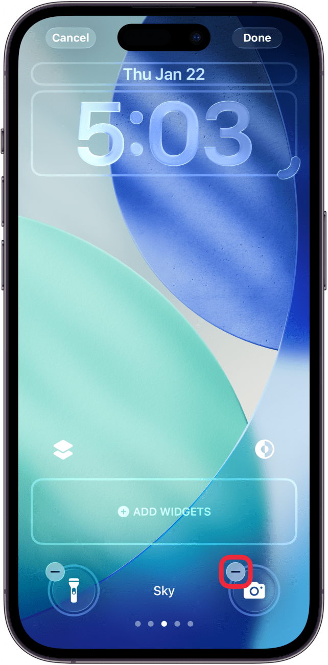 a screenshot of the iphone lock screen customization screen with a red box around the minus symbol next to a shortcut icon