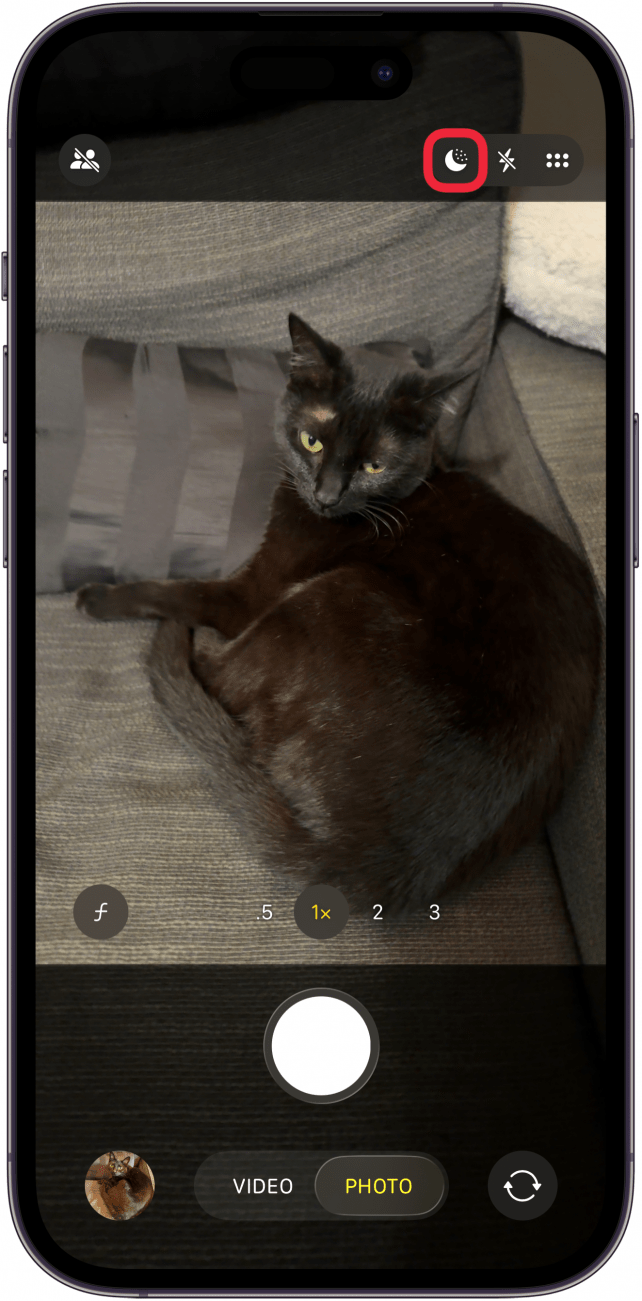 a screenshot of the camera app on the iphone with a red box around the night mode icon, which is gray