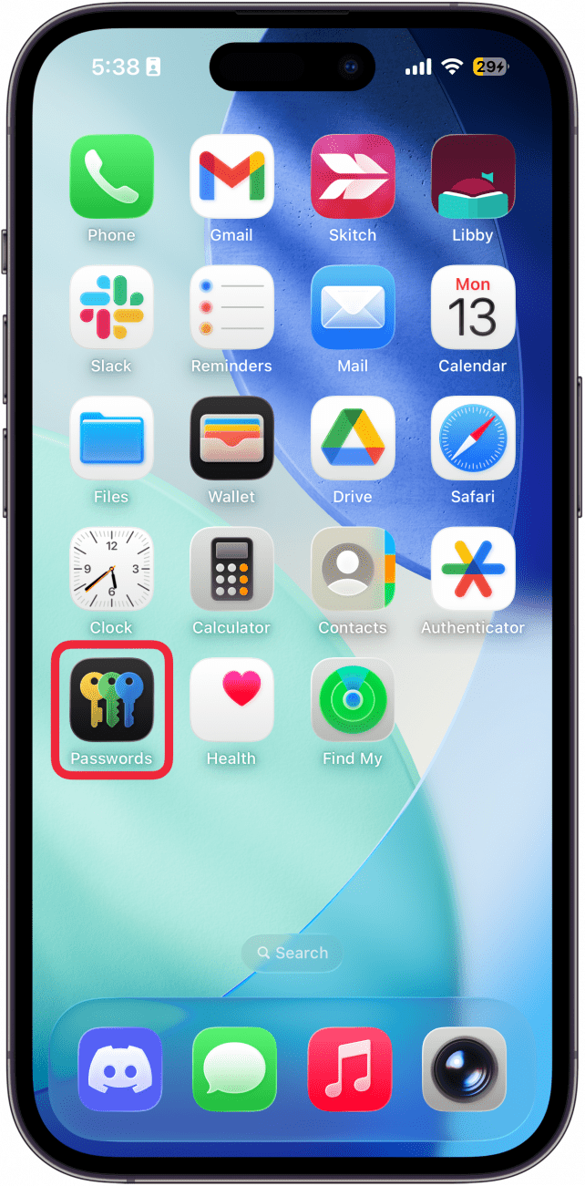 a screenshot of the home screen on iphone with a red box around the passwords app