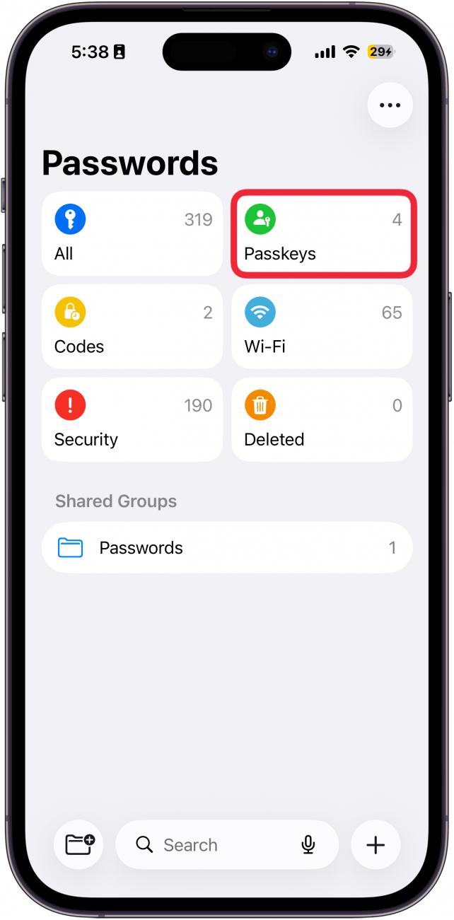 a screenshot of the iphone passwords app with a red box around passkeys