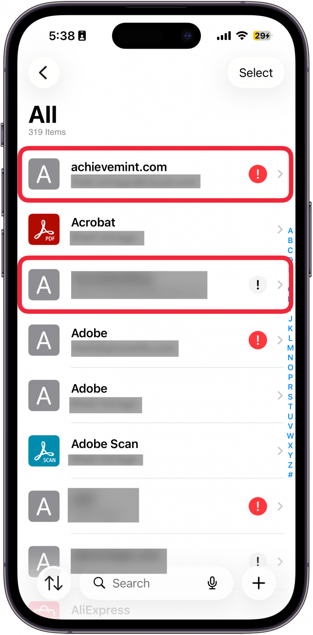 a screenshot of the iphone passwords app all passwords list with a red box around two passwords, one with a red exclamation and one with a gray exclamation