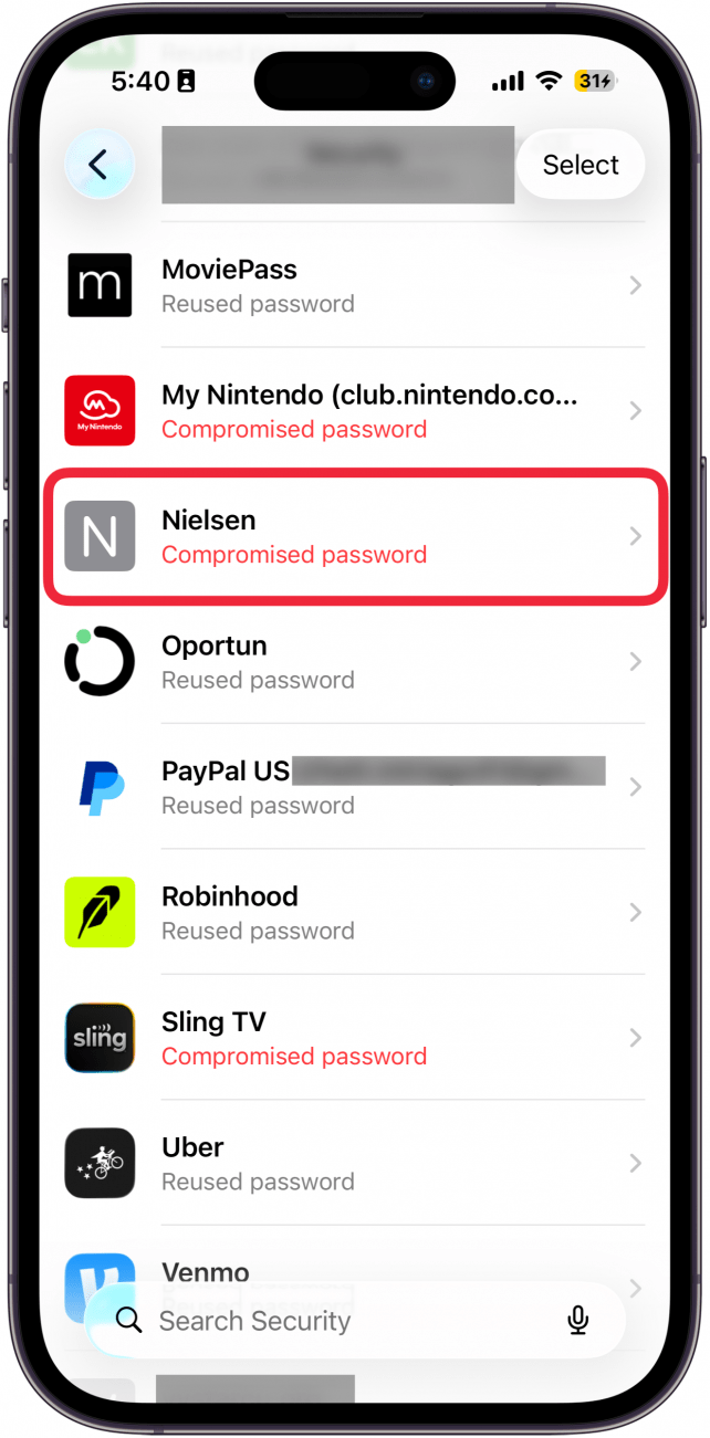 a screenshot of the iphone passwords app security screen with a red box around a facebook password at the top of the list that is marked as compromised