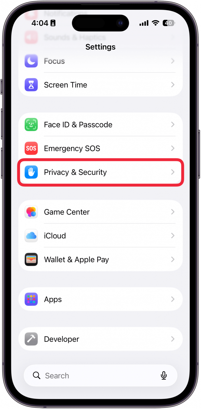 a screenshot of the iphone settings app with a red box around Privacy & Security