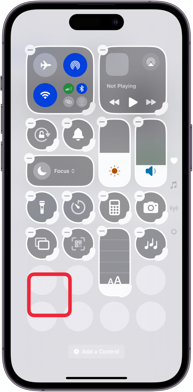 tap blank spot in control center to exit edit mode