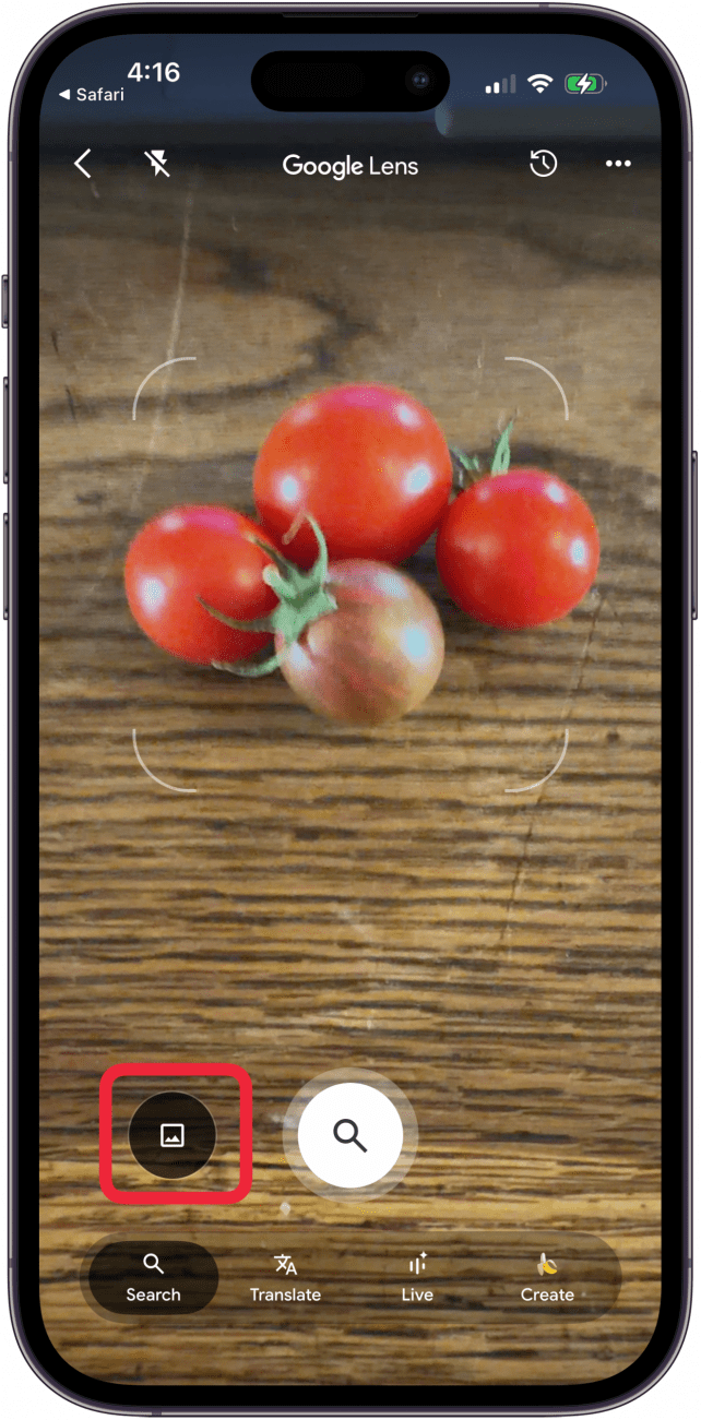 tap the black photo icon to access photo library