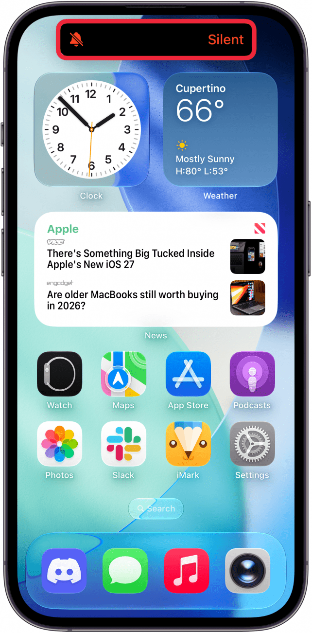 a screenshot of the iphone home screen displaying a notification in the dynamic island that silent mode has been enabled