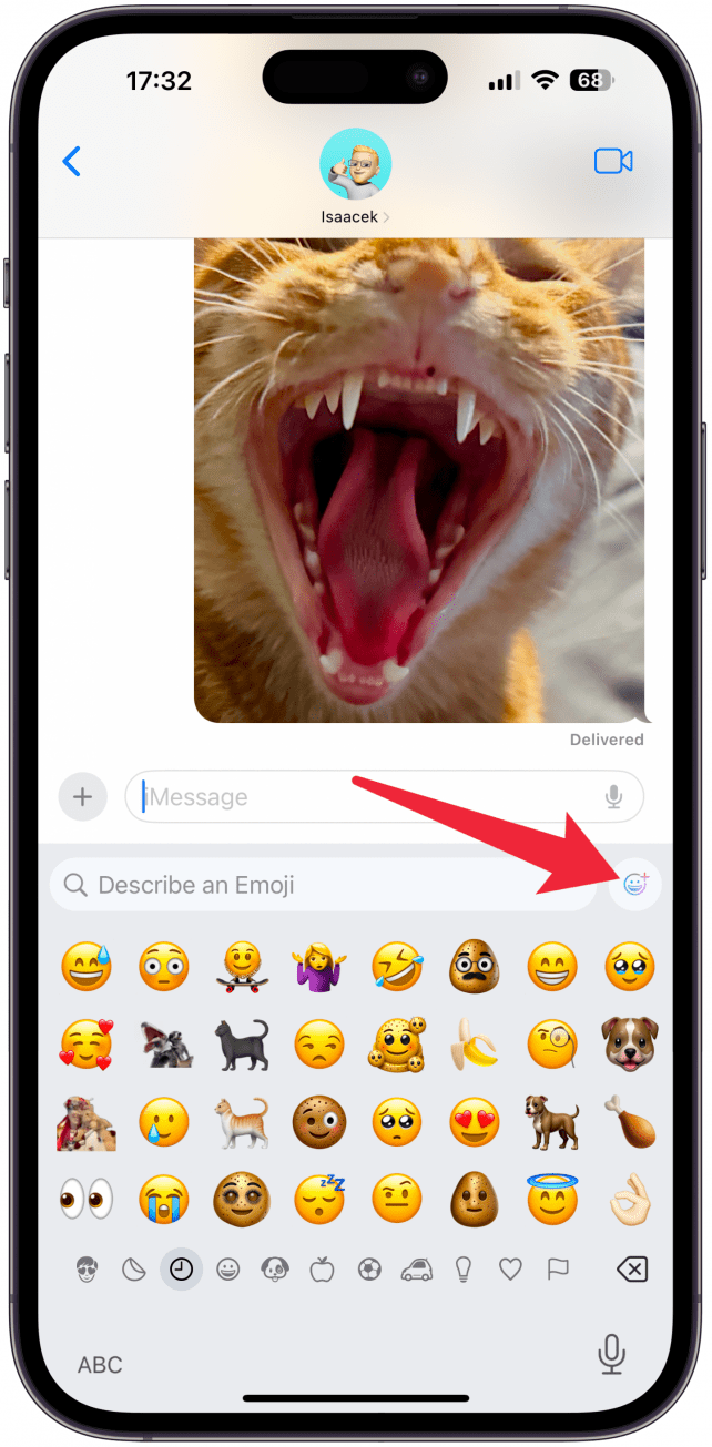 Tap the Genmoji icon (colorful emoji with a plus icon) to the right of the Describe an Emoji field.
