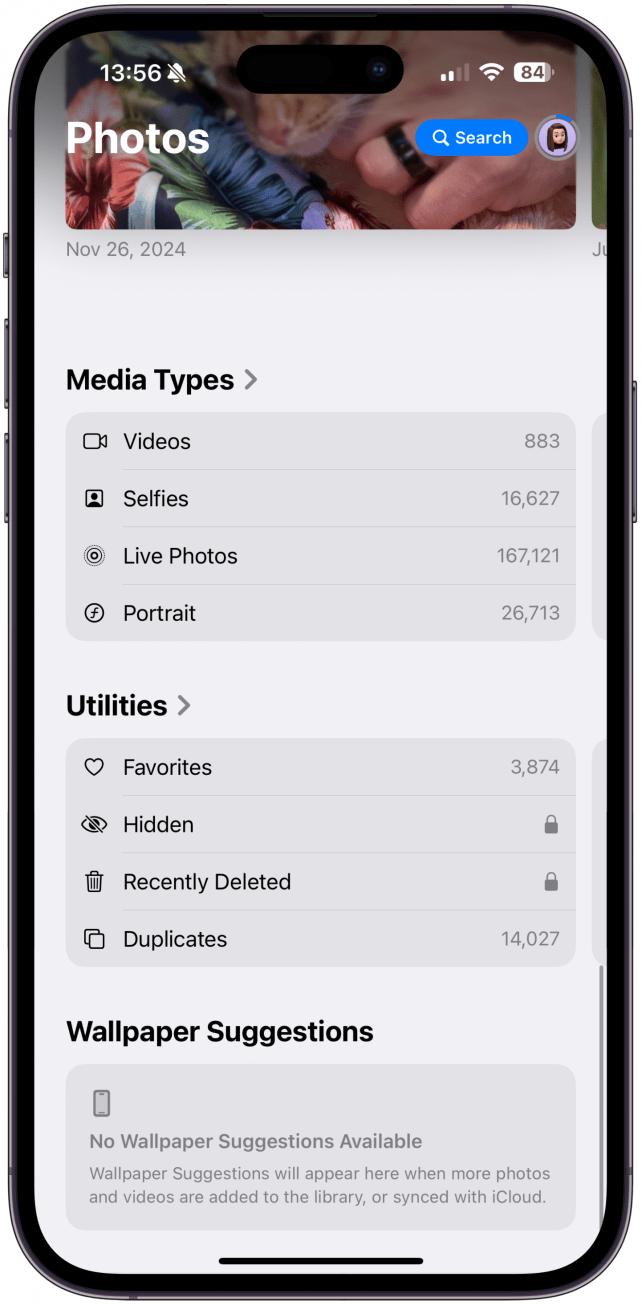 Keep scrolling to find Shared Albums, Memories, Trups, Featured Photos, Media Types, Utilities, and Wallpaper Suggestions. 