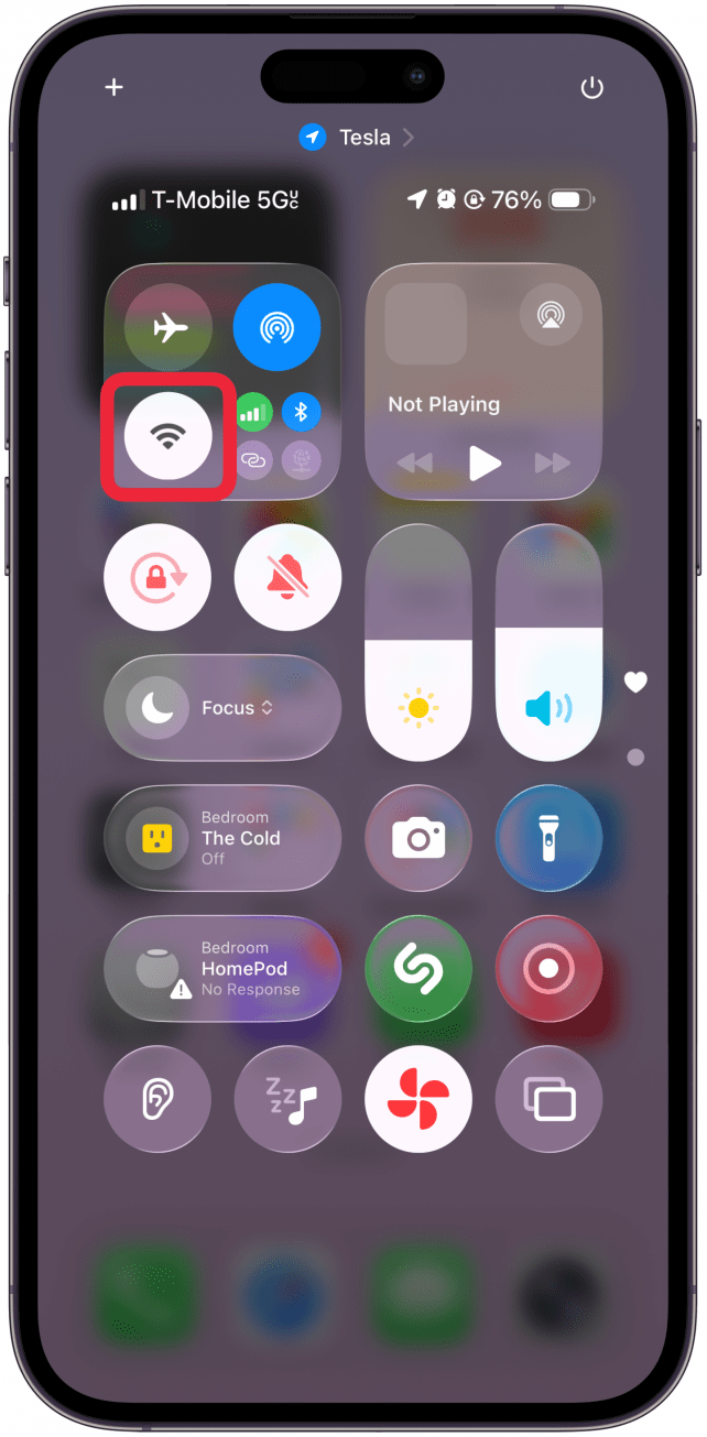 Tap the empty space between the icons or tap and hold the Wi-Fi icon.