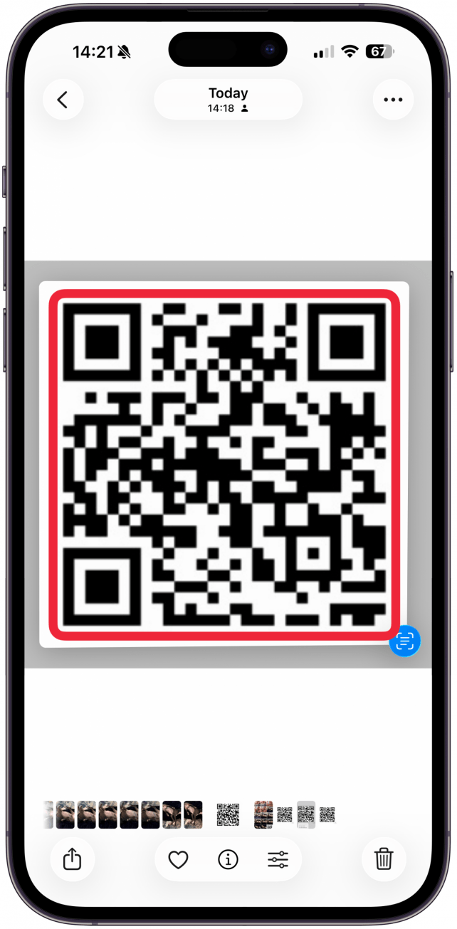 Touch and hold the QR code again.