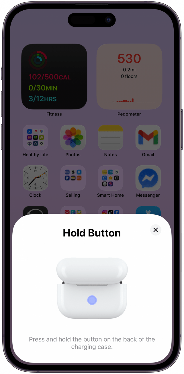 Following the on-screen prompts, press and hold the Setup button on the back of the AirPods' case. This is how to put AirPods in pair mode. 