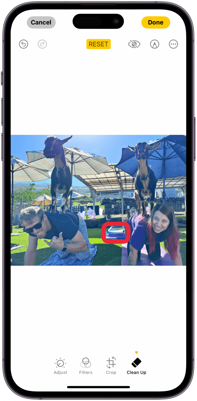 If Apple Intelligence doesn’t seem to be detecting the object you want to remove, you can scribble over it with your finger and the AI will do its best to remove the object.