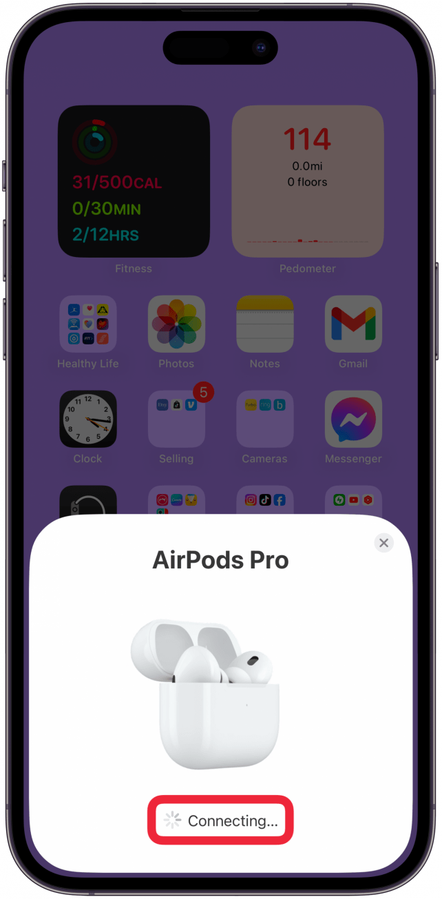 You can release the button once the status light changes to white. Your AirPods will begin connecting.