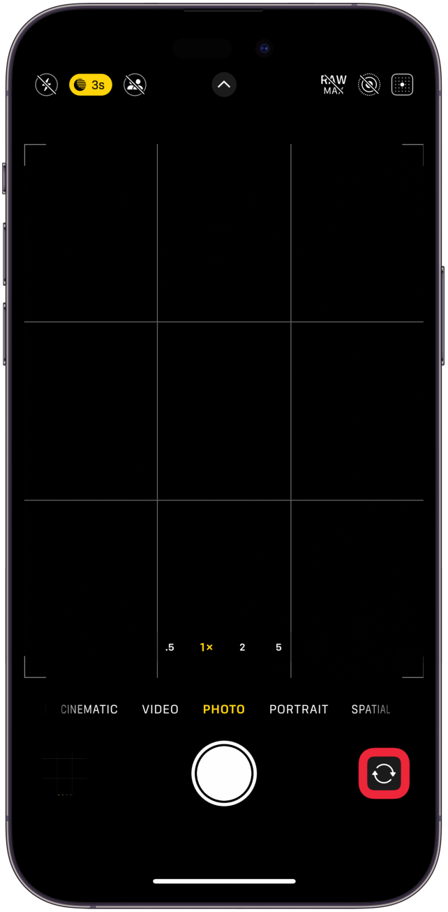Tap the camera switch icon in the lower right (it looks like two arrows spinning in a circle).