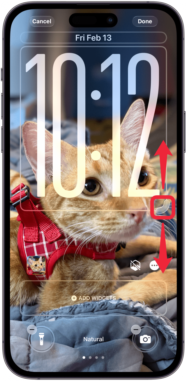 Next, you can also drag the time from the bottom right corner to change the size of it on your screen, which is only possible if you keep Glass selected rather than Solid. While you are dragging it, it will appear in front of your subject (if you have a layered wallpaper like a Photos one), but once it is saved, the subject will show up in front of the time, even if you stretch the numbers as far as they go which might hide the time in some cases.