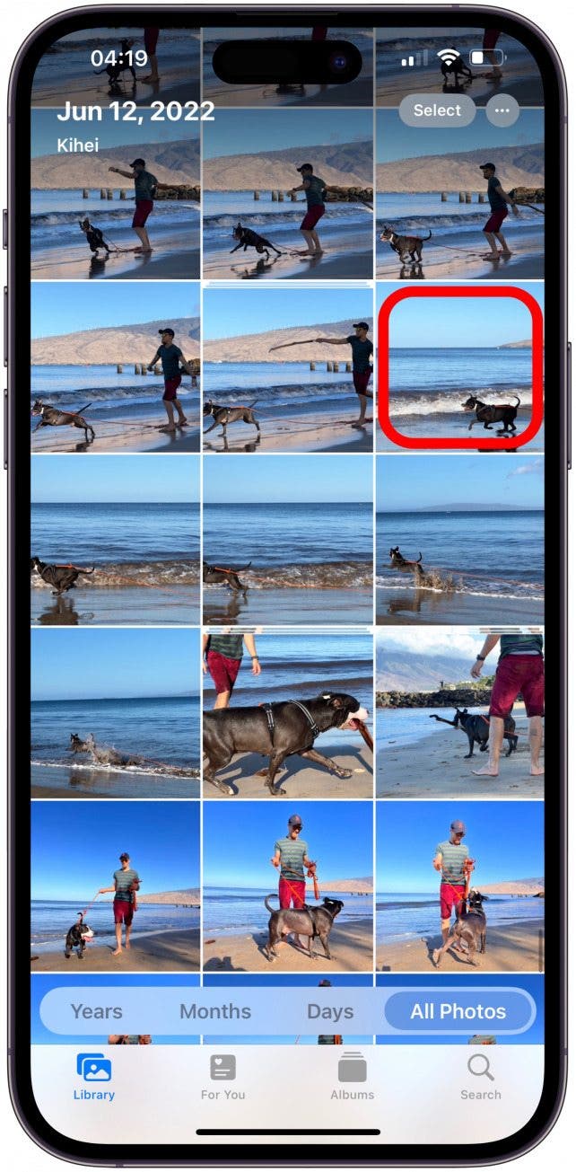 Tap a photo or video.