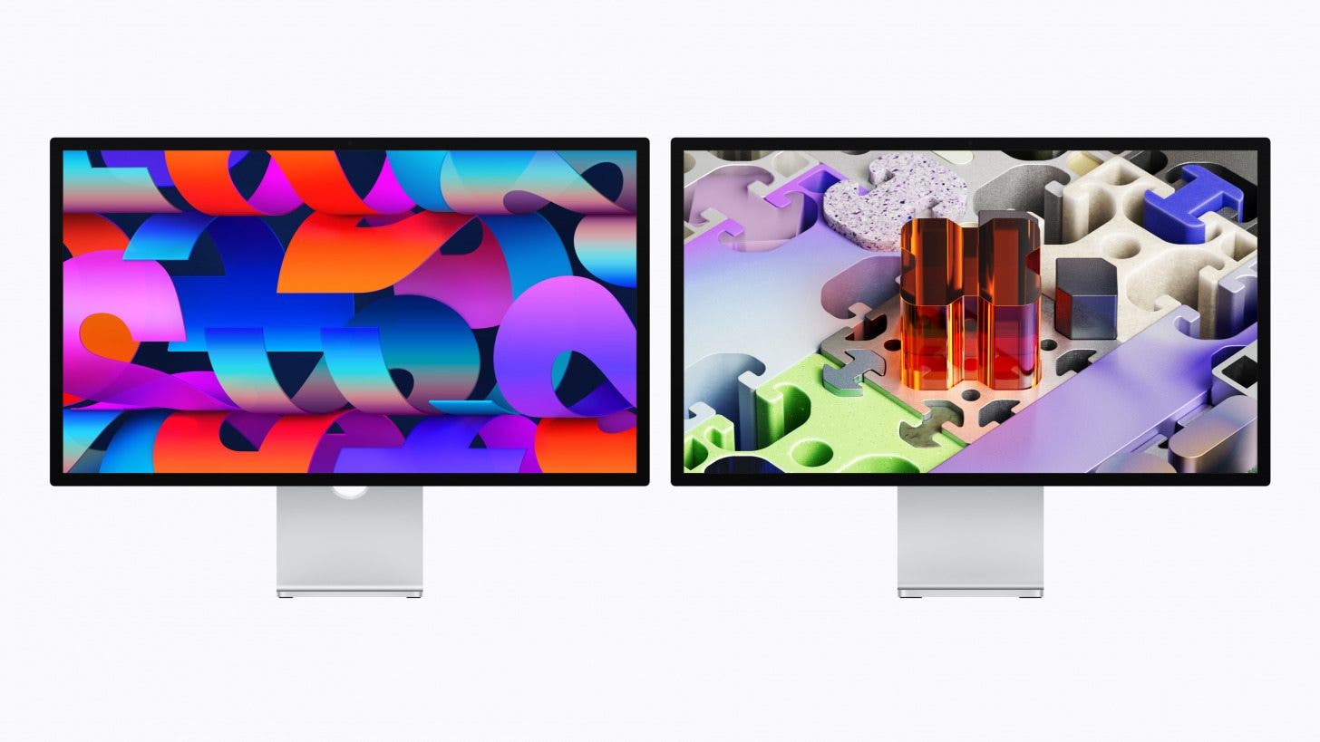 a photo of the apple studio display and studio display xdr, with colorful images on each screen